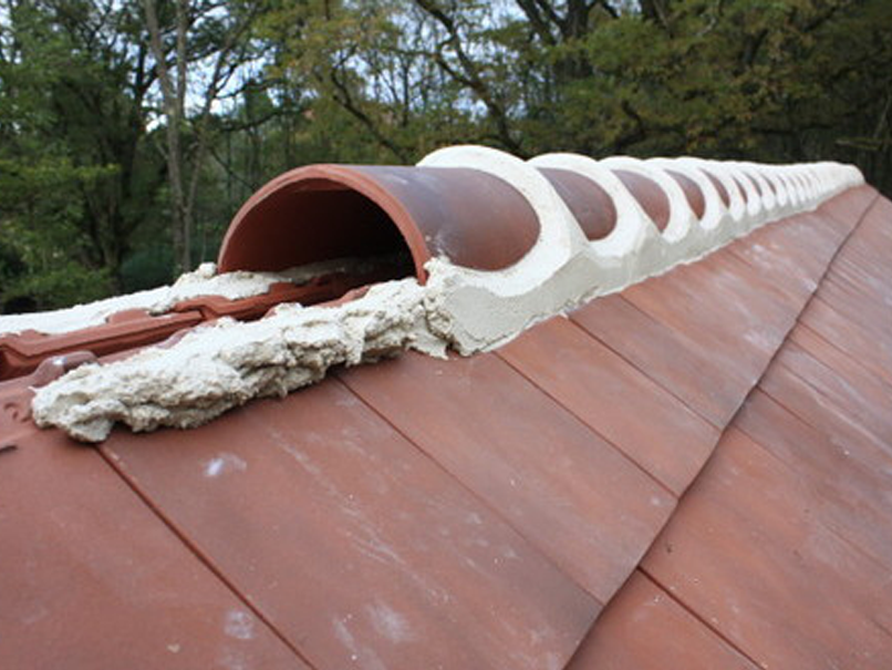 Travaux de rénovation et d'entretien de toiture